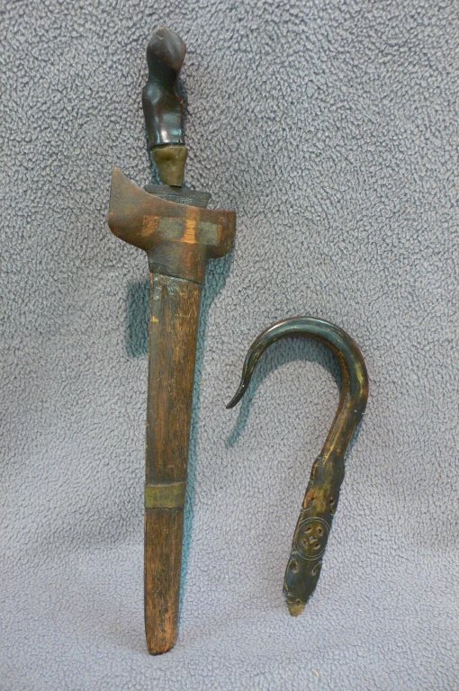 miniature Indonesian Kris & animal head handle: 18C miniature Indonesian Kris, with ancient hammered meteorite blade, original sheath, with animal head handle, ..10 1/2"long..Together with a exceptional and early carved horn or tortoise shell, fish