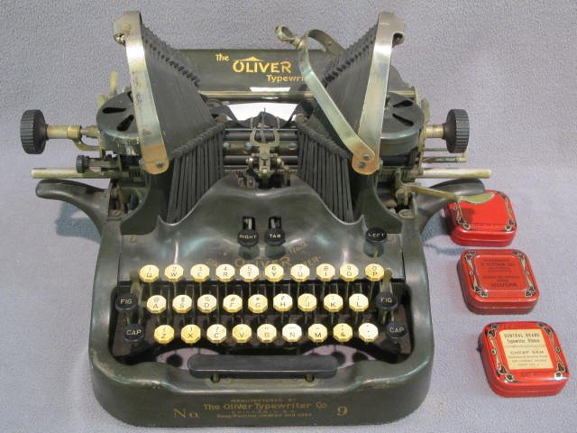 Oliver No. 9 typewriter: Antique typewriter. The No. 9 Oliver Standard Writer, in working condition w/ all parts & spare ribbon in original tin. 12" high.