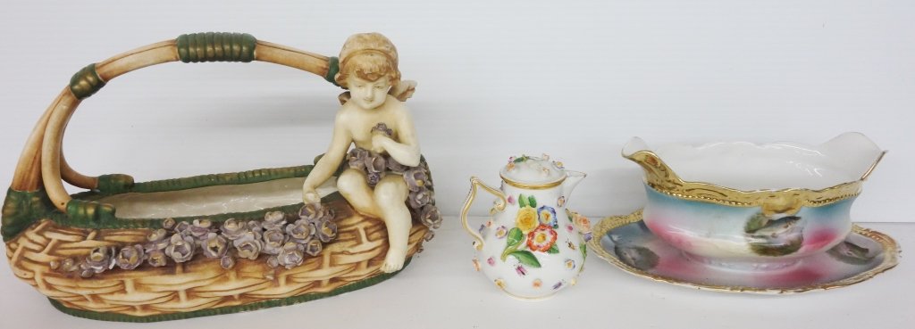 3 pieces porcelain: 3 antique porcelain, Meissen, Teplitz, Bavaria. All 19th century, the Bavaria one piece gravy boat with marks painted with swimming fish. Large Teplitz Austria basket form center piece, imperfect at h