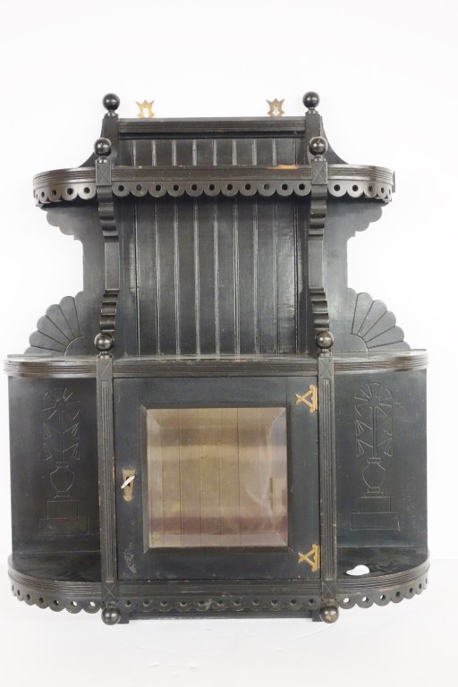 Black Eastlake style wall hanging cabinet: Black Eastlake style wall hanging cabinet. 26 inches x 32 inches.
