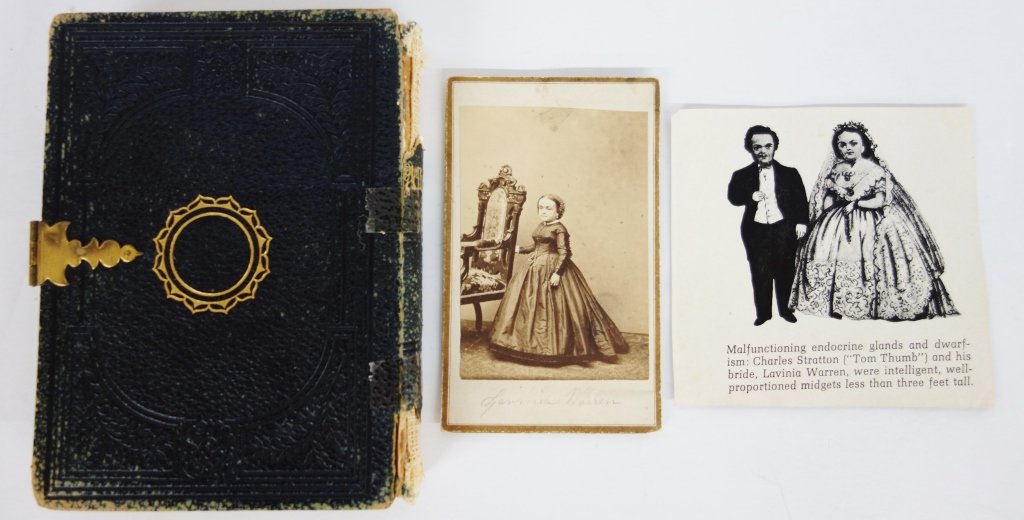 Small photo album with Lavinia warren cabinet card: Small photo album with Lavinia Warren (Tom Thumbs wife) cabinet card & newspaper article. Wear to album