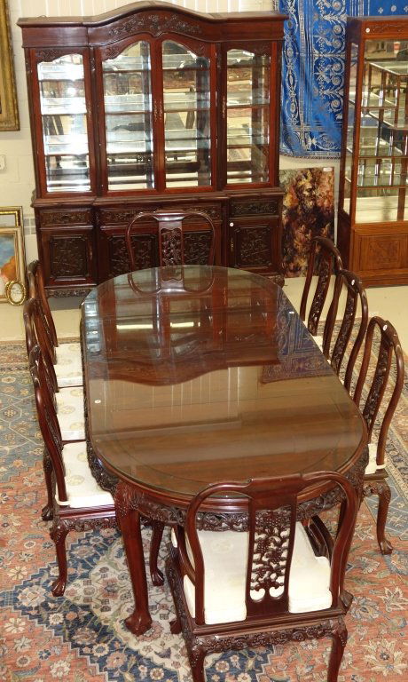 Beautiful ornate Oriental dining room set: Beautiful ornate Oriental dining room set- Large glass china cabinet, dining room table with glass top & 6 chairs. Table measures 95 inches long; cabinet measures 67 inches x 84 inches.