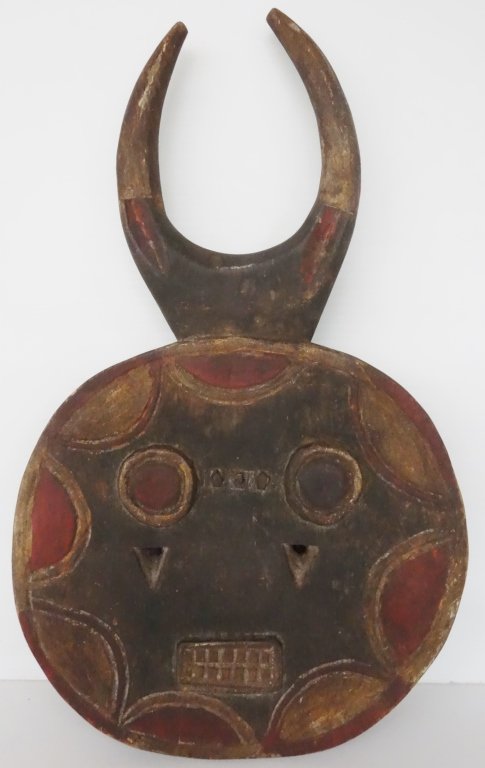 Old carved African wood horned mask (1 of 2)