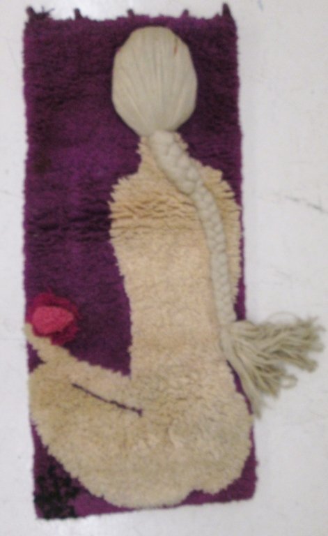 Ege Rya rug: Ege Rya wall hanging rug of woman with braided hair. 45 x 19 1/2.
