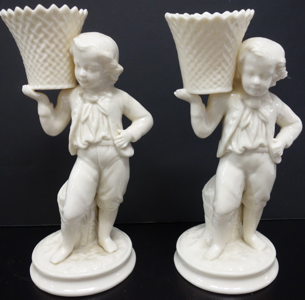 Pair of Belleek boy candle holders (1 of 3)