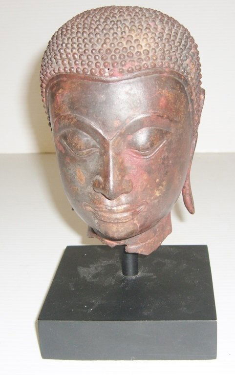 Metal Buddha head statue (1 of 4)