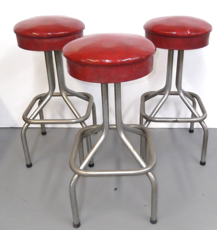 3 red vinyl bar stools with chrome base (1 of 4)