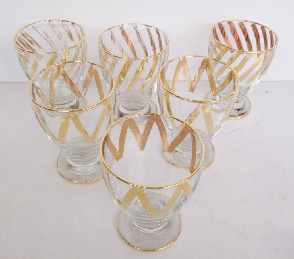 6 gilded glasses: 6 gilded glasses, 2 different designs. Wear. 4 1/2 x 3 1/4