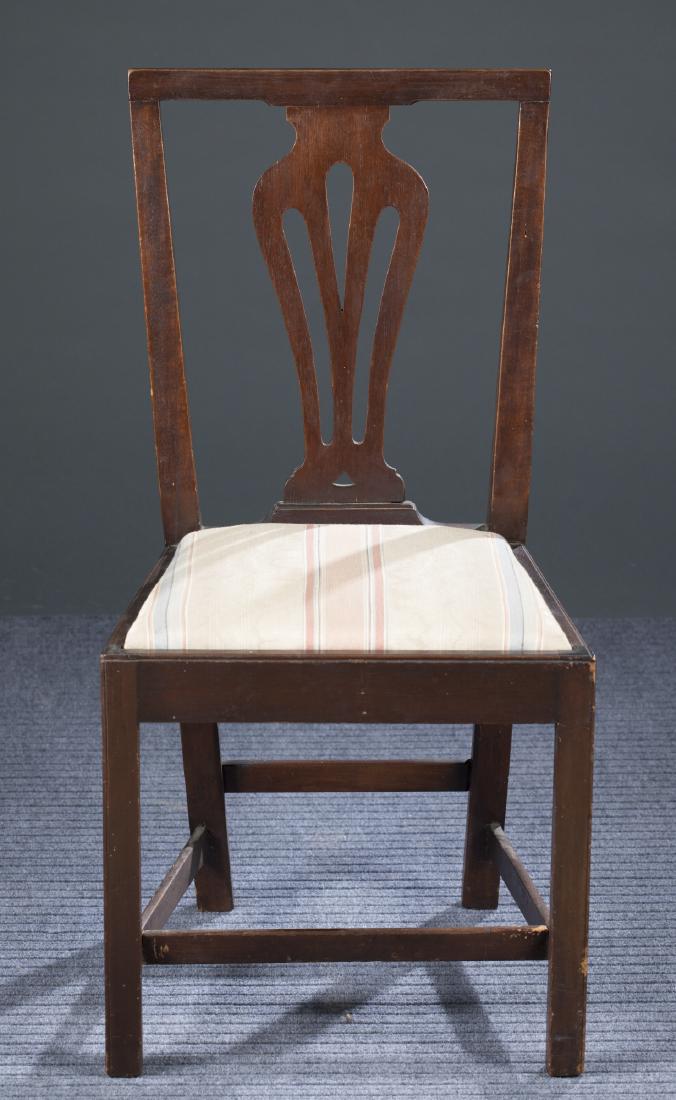 Mahogany Bench-Made Chippendale Revival Chair.: A mahogany bench-made Chippendale Revival chair, 19th century. Square crest rail with cared vase splat, trapezoidal set, resting on straight legs connected by a box stretcher. 37" h x 19" w x 15 1/4" 
