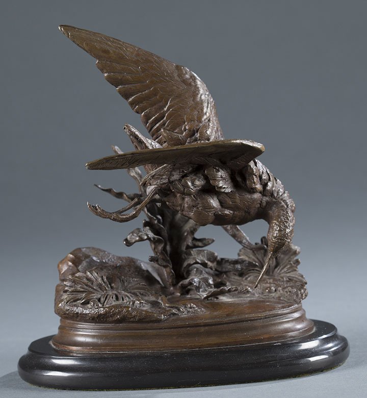 After Jules Moigniez (France, 1835-1894) Bronze.: After Jules Moigniez (France, 1835-1894). Pheasant on rocks (lacking flora). Hollow cast brass. Printed signature on base. 20" h x 18" w.