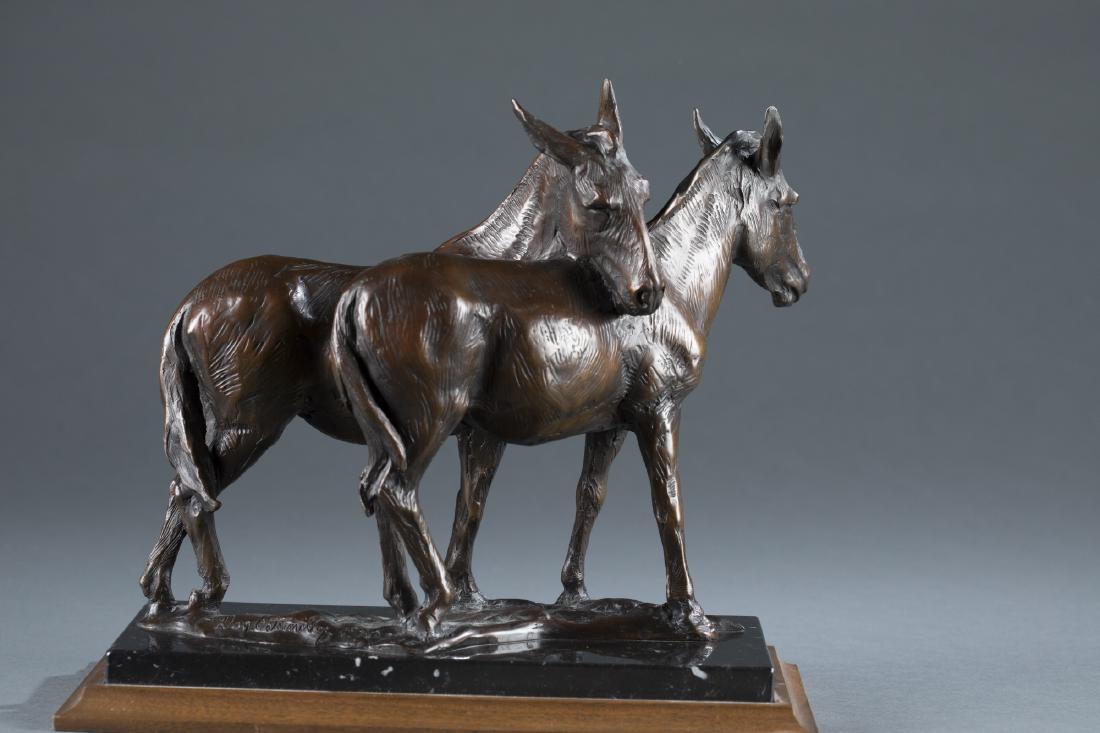 Dan Ostermiller (USA, 20th c.) Mules Bronze.: Dan Ostermiller (United States, 20th century). Pair of mules bronze on marble & wooden base, c.1990. Edition 29/35. Signed signature in mold. 11 1/2" h x 13 1/2" l x 7" w.