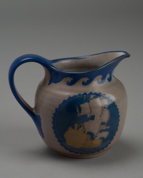 Marblehead Pottery Decorated Ship Pitcher, Shape 35: Marblehead Pottery Decorated Ship Pitcher, Shape 350, Signed by Arthur E. Baggs on Base with Ship Mark. This design appeared in the 1919 Marblehead Pottery catalog and retailed for $5.00 in the 1924 c