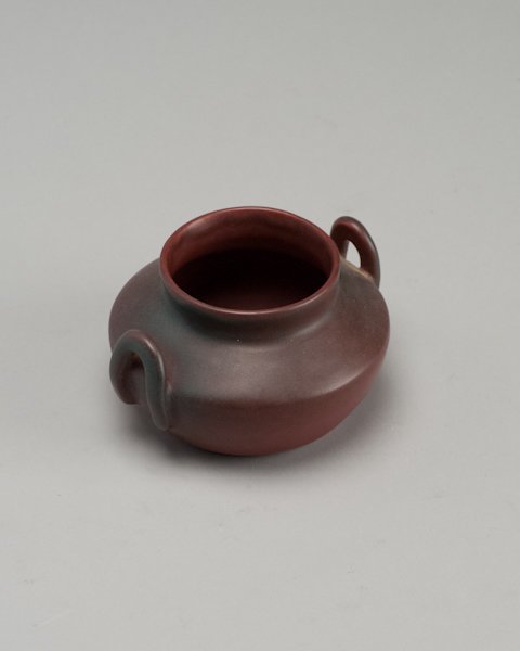 Van Briggle Mulberry Glaze Handled Bowl,: Van Briggle Mulberry Glaze Handled Bowl, marked on base F/D Van Briggle Colo Spgs Original. 3 1/4" H x 5 1/4" dia.