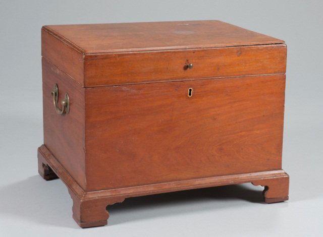 c.1800 mahogany cellerette: A mahogany cellarette. c.1800. Having molded edge to the top, interior missing dividers, brass double handles and pull to top, and a molded bracket base. Pine secondary. Provenance: APVA deaccession.