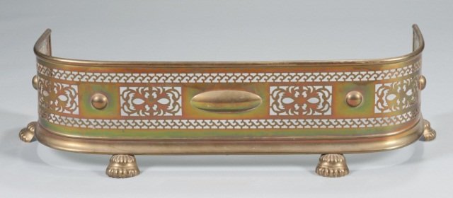 A Brass Fender with Ornate Piercings and Four Paw: A Brass Fender with Ornate Piercings and Four Paw Feet, ca. 1820. Provenance: APVA deaccession. 9 1/2"" H x 38"" W x 14"" D.