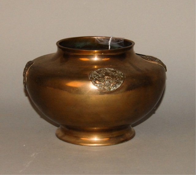 Asian Brass Planter: With applied decorative medallions, 6 1/4" high and 9 1/4" diameter.