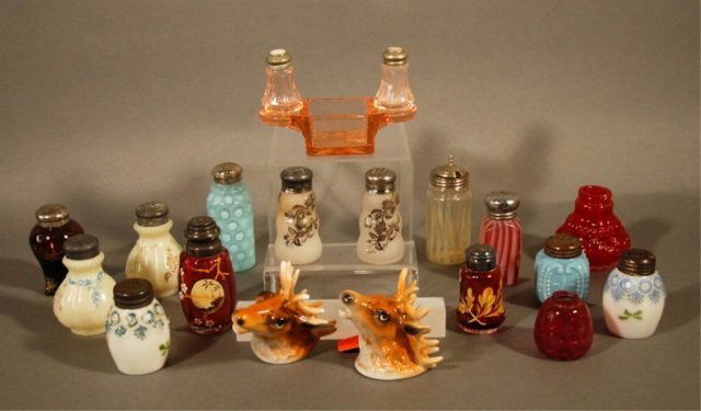Nineteen Salt and Pepper Shakers to Include: two figural moose heads, silver overlay, rib and scroll, pigeon blood, and intaglio Worthwood blue.