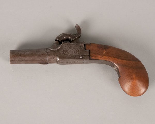 Circa 1860 Single-Shot Belgian-Made Muff Pistol Wi: Circa 1860 Single-Shot Belgian-Made Muff Pistol With Folding Triggerguard. The Screw-Off Barrel Measures 1-5/8" In Length. Each Side Of Pistol Engraved With Floral Designs.