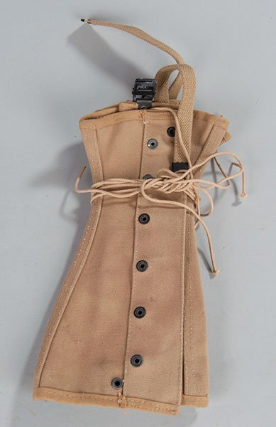 World War II mint-pair light tan-colored leggings c: World War II mint-pair light tan-colored leggings complete with legging string. Soldier’s name “DONOHUE” stenciled on one side and maker- marked “GREGORY & READ CO.” and dated 3/12/43.