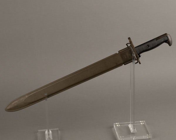 World War II US Army M-1 Rifle bayonet with 15-3/4: World War II US Army M-1 Rifle bayonet with 15-3/4” long blade. Stamped on one side of blade is “U.C.” over Ordnance Department flaming bomb having a “U” on one side and an “S” on the ot