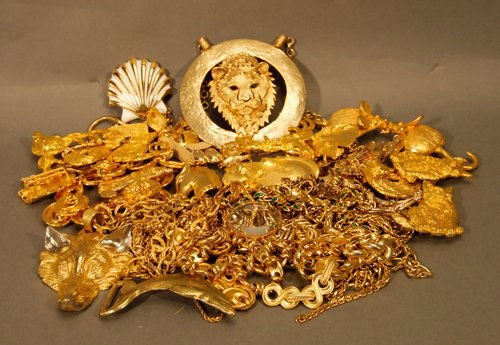 Assortment of Costume Jewelry: Assortment of Costume Jewelry ""Gold"" Belt Slides in the Form of Foxes, Cats, Lions and Other Misc. Animals, Includes Link Bracelets and Necklaces, Varying Sizes and Lengths.