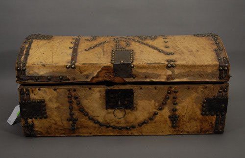 Cowhide Covered 19th Century Trunk With iron hardw: Cowhide Covered 19th Century Trunk With iron hardware leather reinforcement afixed with brass tacks and the letters "J" "W" and "D" in brass tacks set into lid. Height: 11" Width: 24" Depth: 13 1/2"