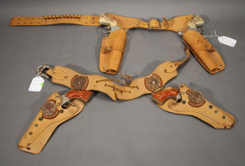 2 sets of Vintage Cap Pistols and Holsters Mattel: 2 sets of Vintage Cap Pistols and Holsters Mattel Fanner 50 Pioneer copies of Colts.