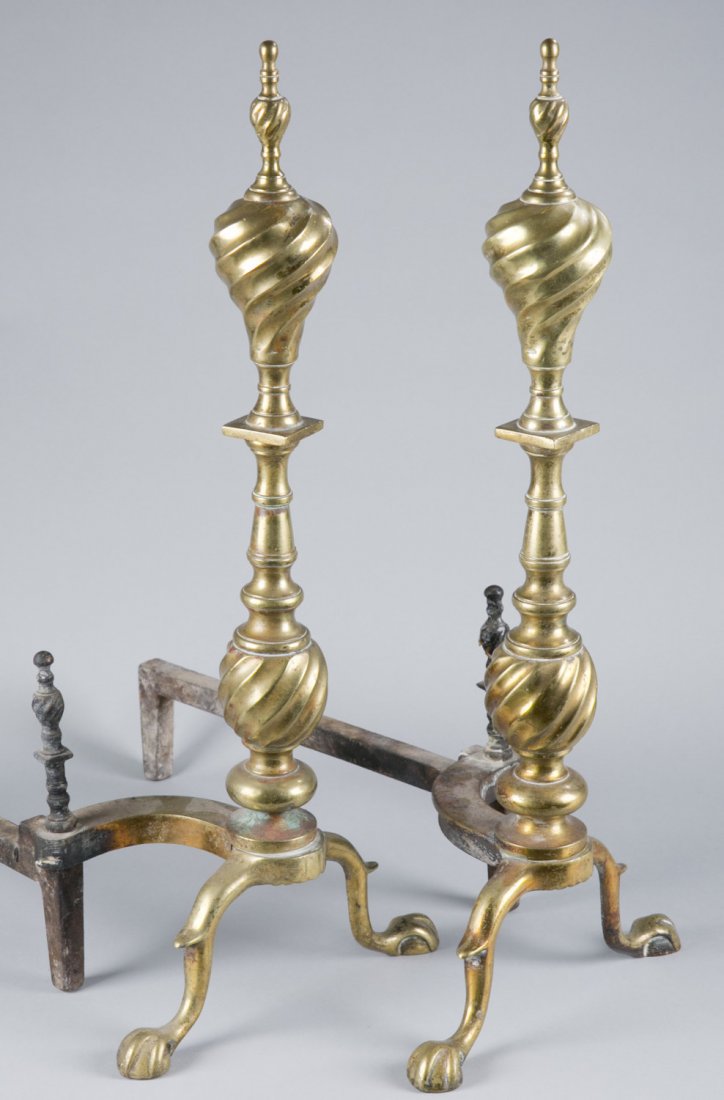 Pair of Brass Andirons: Pair of Brass Andirons Turned finials with candle form body and terminating on claw and ball feet. 22"" H