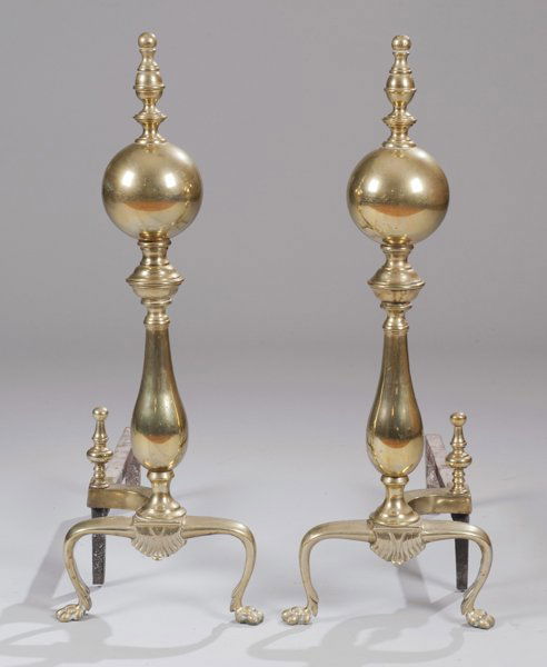 Pair of Brass Andirons: Pair of Brass Andirons ball-top with finial, arched base terminating in claw feet. 25"" H