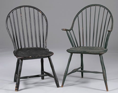 Two Late 18th Century Painted Windsor Bowback Chairs: Two Late 18th Century Painted Windsor Bowback Chairs One green arm chair and one black side chair, both with saddle seats. 35"" h x 17"" w x 16"" d