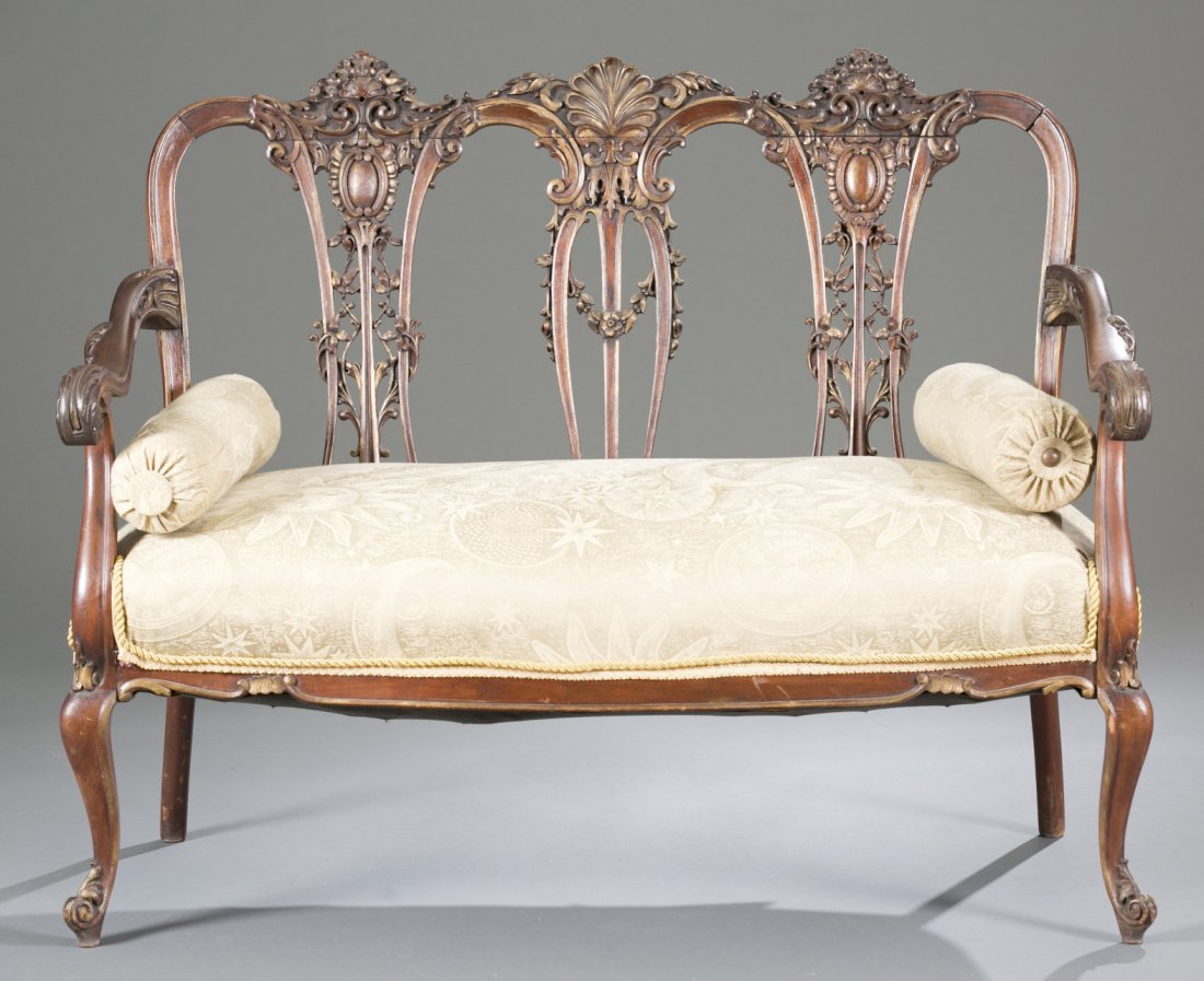 19th Century Rococo Style Mahogany Settee: 19th Century Rococo Style Mahogany Settee Carved shell and foliate crest rails and splats. Center splat has floral swag. Acanthus formed scroll arms. Modern sun and star tan upholstery. 36 1/2"" x 46 