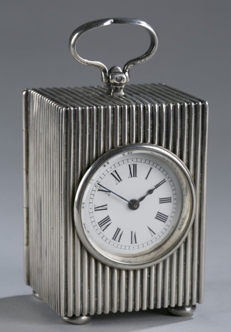 Sterling Silver Carrington & Co. Carriage Clock, 1889: Sterling Silver Carrington & Co. Carriage Clock, 1889 Maker's mark of William Thomas Wright & Frederick Davies. Movement marked, ""Paris."" 3"" H x 2"" W x 1 3/4"" D