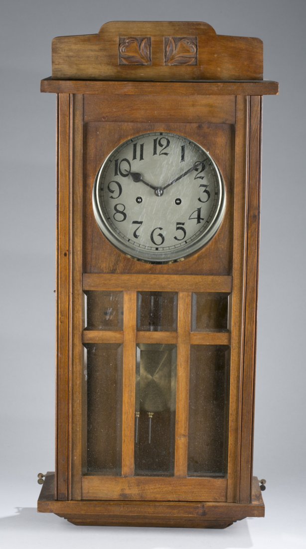 Victorian Style Walnut Wall Clock: Victorian Style Walnut Wall Clock Floral carved crest with beveled glass door. 30"" H x 13 1/2"" x 6""