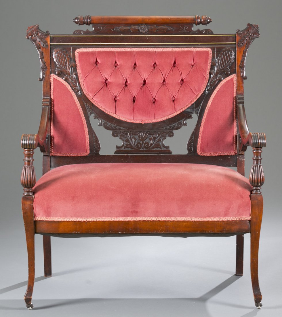 Victorian Mahogany Settee: Victorian Mahogany Settee Carved back with red tufted seat back and sold red seat upholstery. 41 1/2"" x 36"" x 19 1/2""