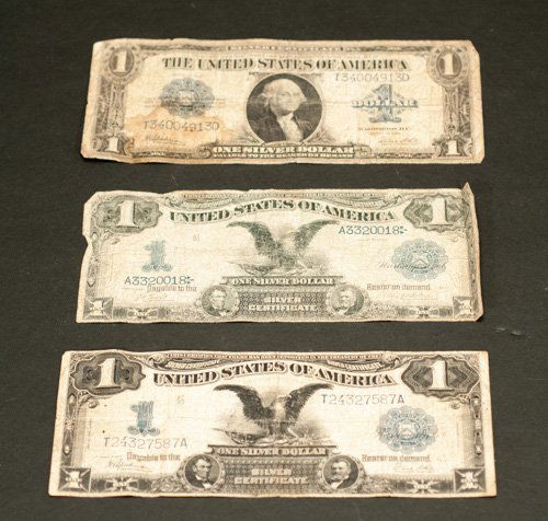 Three United States of America One Dollar Bills: Three United States of America One Dollar Bills To include: Two Silver Dollar Notes 1899 1899 and One Dollar 1923. 7 1/4""