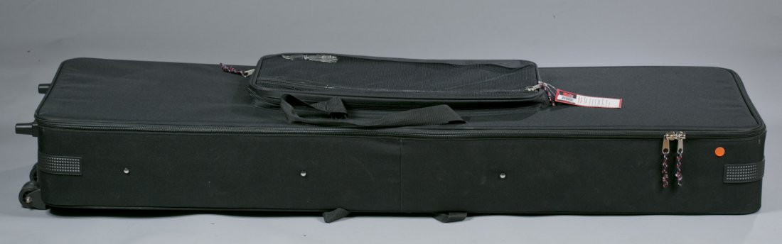 Korg Keyboard Music Workstation Synthesizer, Model No.: Korg Keyboard Music Workstation Synthesizer, Model No. M3-88 Serial number 003368. Black gator soft case.