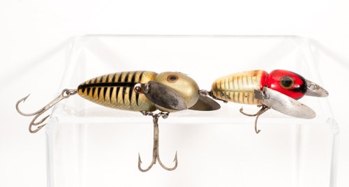 Pair of Heddon Crazy Crawlers Fishing Lures: Pair of Heddon Crazy Crawlers Fishing Lures To include (two pieces): one large green crazy crawler marked Heddon to bottom and one red-headed Heddon crazy crawler marked Heddon, crazy crawler to botto