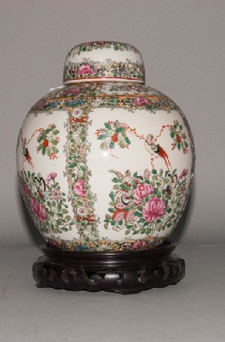 Asian Round Ginger Jar with Base: Asian Round Ginger Jar with Base Round, Asian ginger jar includes base. Painted with flower, scroll, butterfly, and bird motifs. Has round stamp with Asian lettering on bottom. 8 1/2"" H x 4"" W