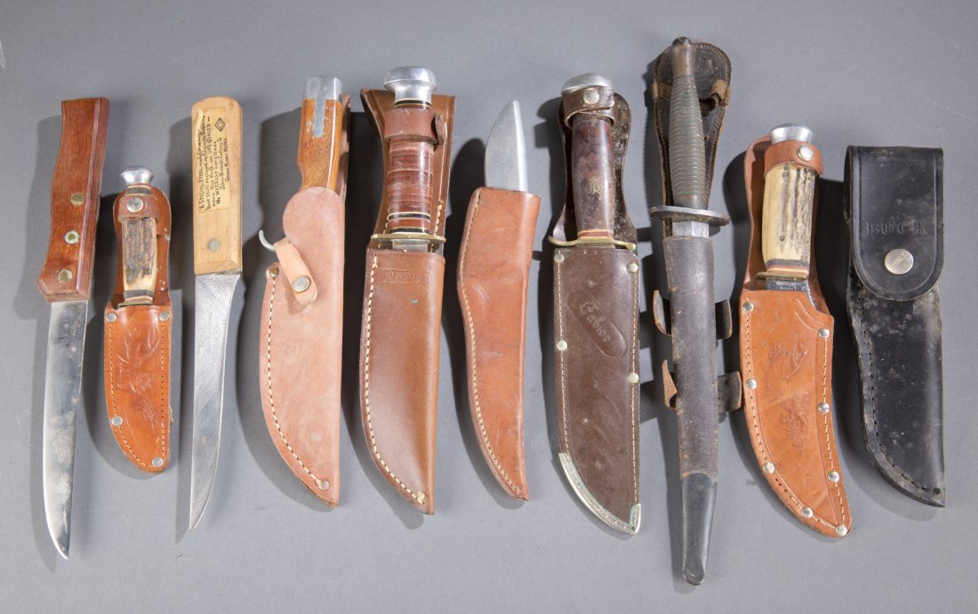 Lot of Ten (10) Knives: Lot of Ten (10) Knives Includes: eight (8) various hunting style knives with leather holders, two (2) wooden handled kitchen knives. Largest: 13 1/2"" L