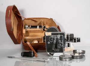 Paillard Bolex Movie Camera Set: Paillard Bolex Movie Camera Set To include: Bolex Paillard movie camera body with four lenses, extra filters, and rolls of film. First lens labeled ""Yvar 1:3,3 f=100mm."" Second lens labeled ""Pizar 