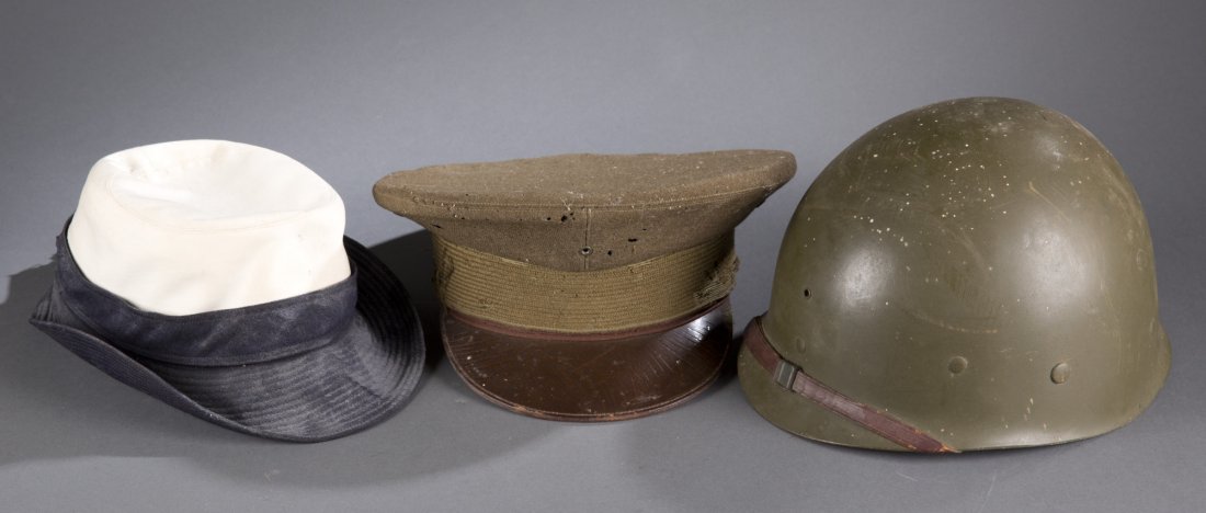 Lot of Three (3) WWII Era Military Hats: Lot of Three (3) WWII Era Military Hats Includes: One (1) helmet liner inscribed with ""John A. Dowden, 43281316"", one (1) Officer's cap, and one (1) blue and white WAVES cap. Largest: 10 1/2"" Dia