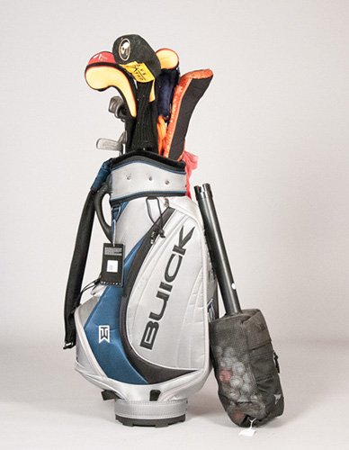 Nike Buick Golf Bag w/ Clubs and Golf Balls: Nike Buick Golf Bag w/ Clubs and Golf Balls To include (19 clubs): 2x 1 iron, 2x W4, 2 iron, 3x midsize fairway driver, 3x 3 irons, 2x 8.5degree King Cobra Titanium 1 driver, 1 9.5degree Titanium 1 dr