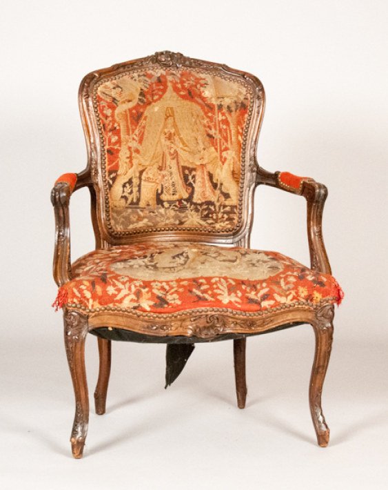 Queen Anne-Style Needlepoint Upholstered Armchair: Queen Anne-Style Needlepoint Upholstered Armchair Upholstered in 15th Century unicorn tapestry pattern. Carved handles and knees. 36" H x 26" W x 19" D