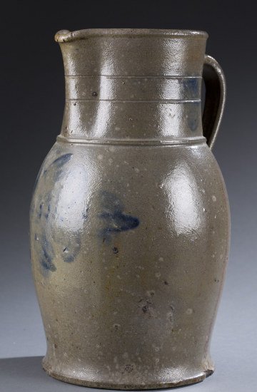 J.M. Hickerson Stoneware Pitcher Strasburg, VA: J.M. Hickerson Stoneware Pitcher Strasburg, VA Ovoid body with straight neck. Maker's stamp to side. The pottery of James M. Hickerson (1833-1902) Shenandoah Valley of Virginia. With small hairlines. 
