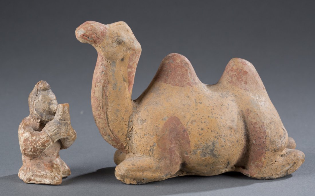 Asian Pottery Figures, 20th Century or Earlier: Asian Pottery Figures, 20th Century or Earlier Praying warrior with his camel. Remnants of original paint. 4"" H x 6"" L