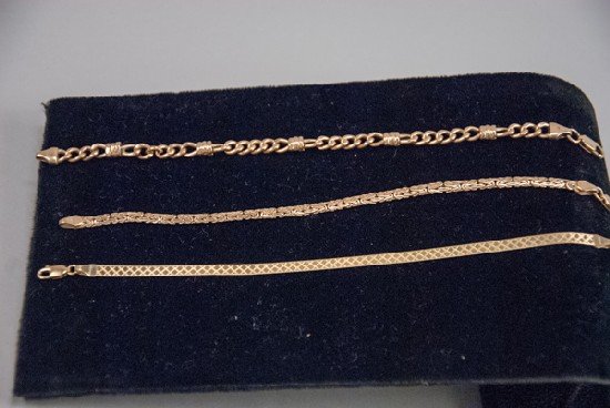 Three (3) 14K Gold Chain Bracelets: Three (3) 14K Gold Chain Bracelets To include three pieces. 8.6 dwt total weight. 2"" diam
