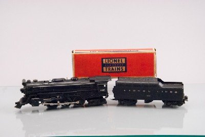 Lionel 665 Locomotive and 2046W Tender: Lionel 665 Locomotive and 2046W Tender To include (three pieces): No. 2046W Tender with Whistle with original box, 665 Locomotive. 3 1/2"" H x 11"" W