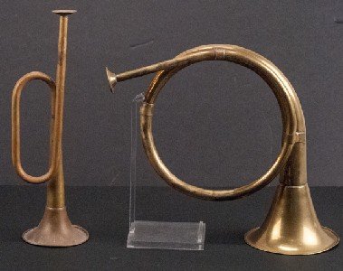 Two (2) Brass Horns: Two (2) Brass Horns To include (two pieces): an early brass hunting horn and a brass bugle. 9 1/2"" H x 9"" W