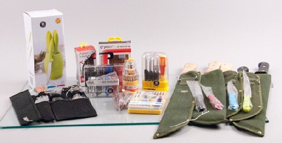 Mixed Lot of Knives and Survival Tools: Mixed Lot of Knives and Survival Tools To include: five (5) machete - different sizes and lengths, two (2) four pack of flashlights, nine (9) knives, and miscellaneous survival tools and equipment. 23