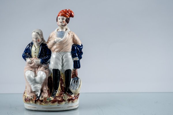 Staffordshire Figural Group: Staffordshire Figural Group Sailing Crew, One Weaving Net, the Other with Handkerchief Cap, Late 19th Century, Good Condition 9" H Provenance: The estate of the late Honorable Robert W. Daniel, Jr. of